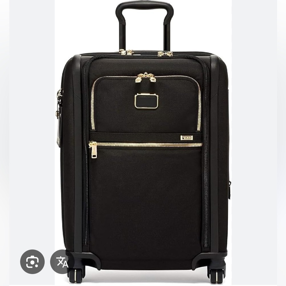 Tumi Black and Gold Suitcase